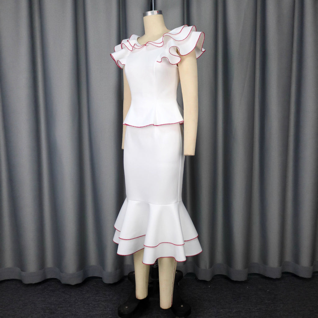 Conjunto de top con volantes y falda de sirena