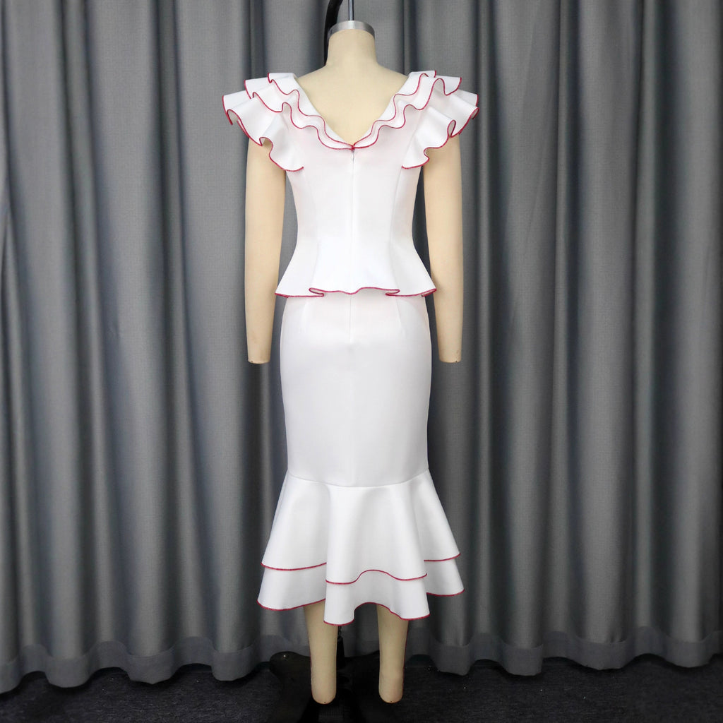 Conjunto de top con volantes y falda de sirena