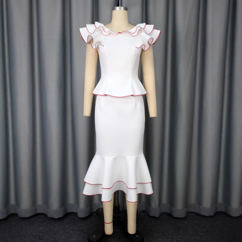 Conjunto de top con volantes y falda de sirena